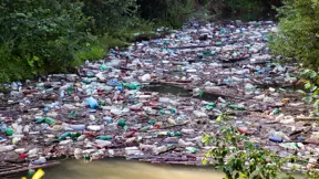New insights into river plastic transport timing