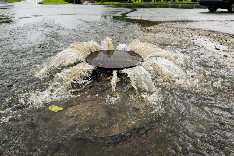 Overflowing manhole cover